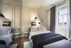 Posteľ alebo postele v izbe v ubytovaní Adriatic Hotel by Maistra Collection