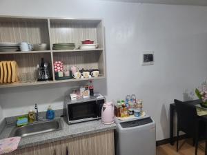Kuchyň nebo kuchyňský kout v ubytování Deca Homes Hampton