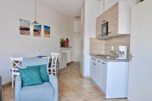 Kuchyň nebo kuchyňský kout v ubytování Wijde Blick 104