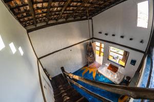 an overhead view of a room with a boat at Duplex Sol in Maresias
