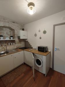 Η κουζίνα ή μικρή κουζίνα στο Gigò Home