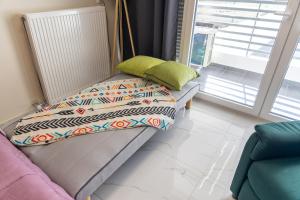 Ein Bett oder Betten in einem Zimmer der Unterkunft Gpxclr SuperiorJuniorTwinSuiteA4