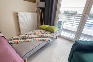 Ein Bett oder Betten in einem Zimmer der Unterkunft Gpxclr SuperiorJuniorTwinSuiteA4