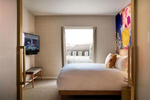 The BoTree - Preferred Hotels and Resorts客房内的一张或多张床位