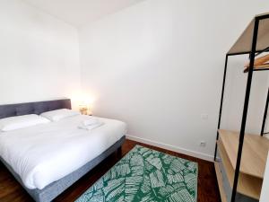 Postel nebo postele na pokoji v ubytování Plateau d'Angoulême proche bus et commerces