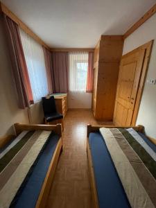 Łóżko lub łóżka w pokoju w obiekcie Ferienwohnung Jank