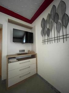 Telewizja i/lub zestaw kina domowego w obiekcie Ferienwohnung Jank