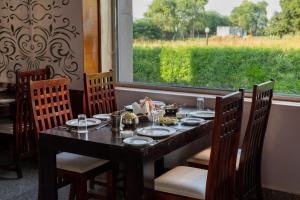 Restoranas ar kita vieta pavalgyti apgyvendinimo įstaigoje Vesta Avtar Resort Pushkar