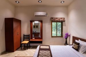 Voodi või voodid majutusasutuse Vesta Avtar Resort Pushkar toas