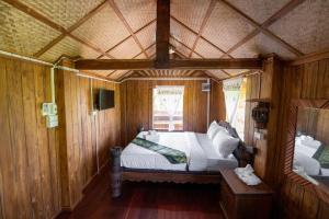 Postel nebo postele na pokoji v ubytování Suk Sabai Homestay