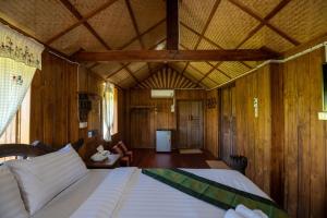 Postel nebo postele na pokoji v ubytování Suk Sabai Homestay