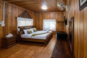 Postel nebo postele na pokoji v ubytování Suk Sabai Homestay