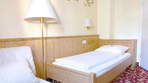Postel nebo postele na pokoji v ubytování Landgasthof Rebstock Weil am Rhein / Basel