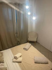 Postel nebo postele na pokoji v ubytování Appartement proche gare TGV + 5 fotografií