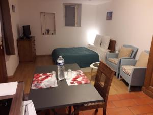 Postel nebo postele na pokoji v ubytování Appart-Hôtel Résidence Maloc
