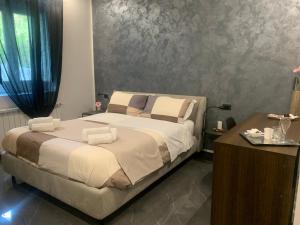 Postel nebo postele na pokoji v ubytování B&B Agriturismo 'A Cunziria
