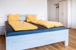 Postel nebo postele na pokoji v ubytování Gwuni B&B