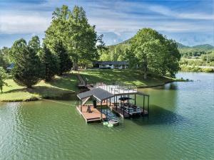 an aerial view of a dock on a lake at Tranquille Resort in Hiawassee