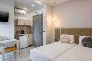Kuchyň nebo kuchyňský kout v ubytování Alexia Seaview Apartments