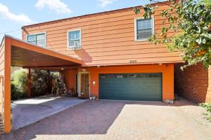 an orange house with a garage at Private, Quiet 2BR in Central Culver City Parking in Los Angeles