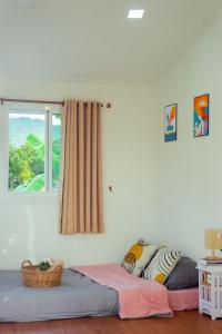 Ένα ή περισσότερα κρεβάτια σε δωμάτιο στο Cana Garden House 3 +58 φωτογραφίες