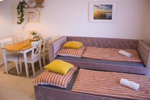 Postel nebo postele na pokoji v ubytování Duplex apartmán Pálava