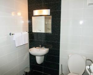 Ванная комната в Hotel Kiprovets