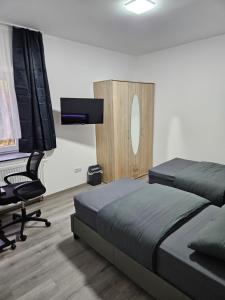 TV a/nebo společenská místnost v ubytování Ferienwohnung 2 Seldüz