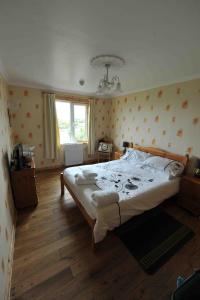 Кровать или кровати в номере Sandwick Bay Guest House