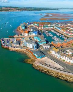 an aerial view of a harbor next to the water at The Point in Exmouth