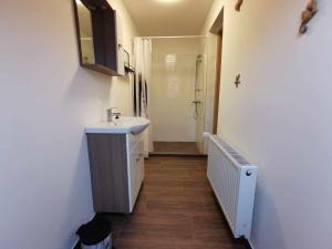 TV a/nebo společenská místnost v ubytování Müller Apartment