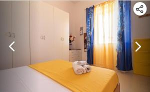 Cama o camas de una habitación en Casa indipendente a 20m dal mare 2 fotos más