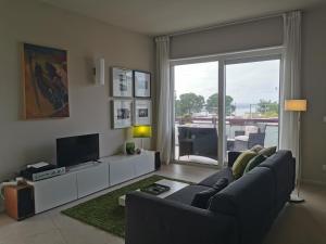 TV a/nebo společenská místnost v ubytování ZagHouses - sea view apartments in Sicily