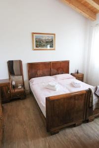 Кровать или кровати в номере Casa Vilma