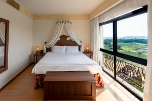 Cama ou camas em um quarto em Spa do Vinho Condomínio Vitivinícola