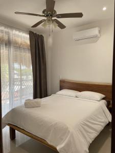 Llit o llits en una habitació de Mexhe Hotel El Cuyo