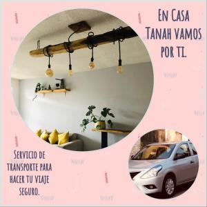 um cartaz para um apartamento com um carro num quarto em Casa Tanah em Guadalajara