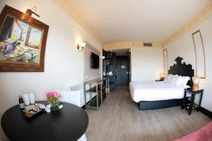 Cama ou camas em um quarto em Spa do Vinho Condomínio Vitivinícola