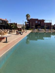 Bazén v ubytování Fellah Hotel nebo v jeho okolí