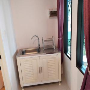 Kuchyň nebo kuchyňský kout v ubytování Palm Tian Homes A2