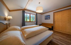 Posteľ alebo postele v izbe v ubytovaní Landhaus Bellevue