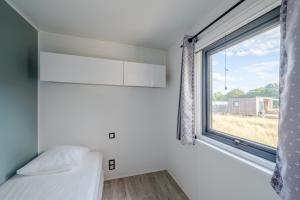 Postel nebo postele na pokoji v ubytování Camping de Saverne
