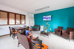 TV a/nebo společenská místnost v ubytování Camping de Saverne