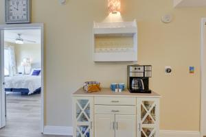 A bed or beds in a room at Miramar Beach Getaway with Balcony and Ocean View!