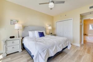 A bed or beds in a room at Miramar Beach Getaway with Balcony and Ocean View!