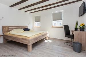 Llit o llits en una habitació de Hotel Duwakschopp