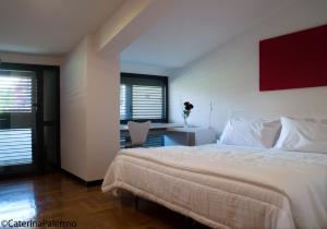 Postel nebo postele na pokoji v ubytování B&B Stazione