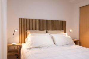 Postel nebo postele na pokoji v ubytování Centenario 1051 by depptö BAJA