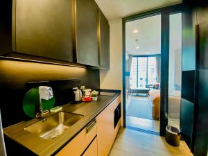 Postel nebo postele na pokoji v ubytování Edge Central Pattaya Vip Condo + 37 fotografií