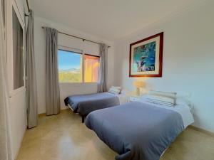 Posteľ alebo postele v izbe v ubytovaní Apartamento Marbella Alicate Beach